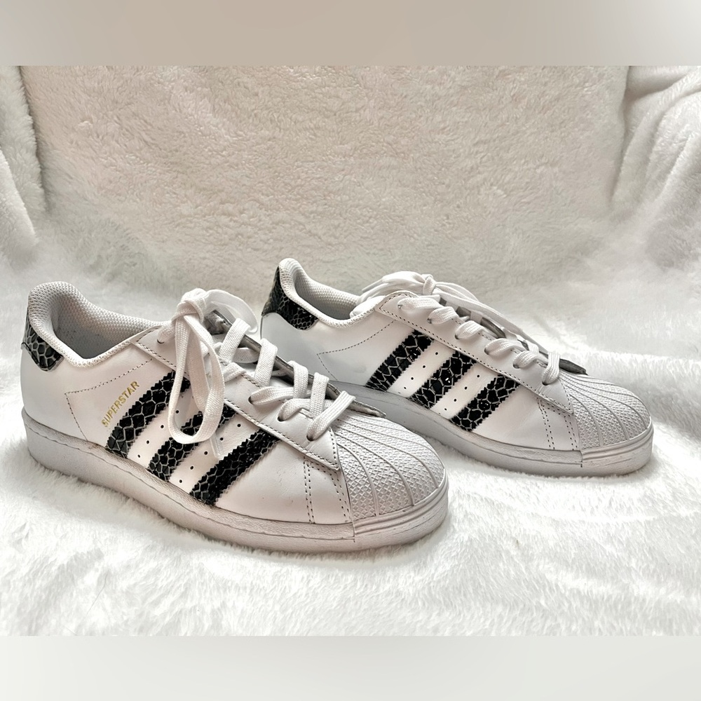 Women’s adidas snake print sneakers